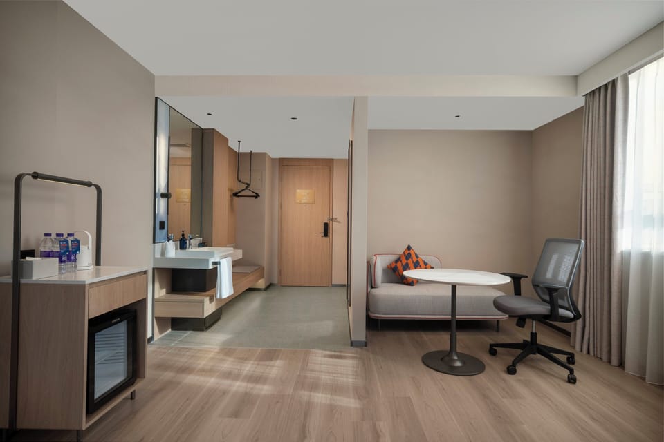 Premium bedding, down comforters, desk, laptop workspace