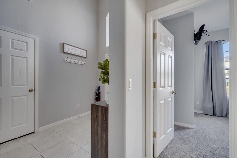 Wide hallway connecting bedrooms with easy access