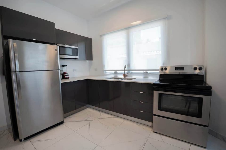 Modern appliances and generous counter space make cooking simple.