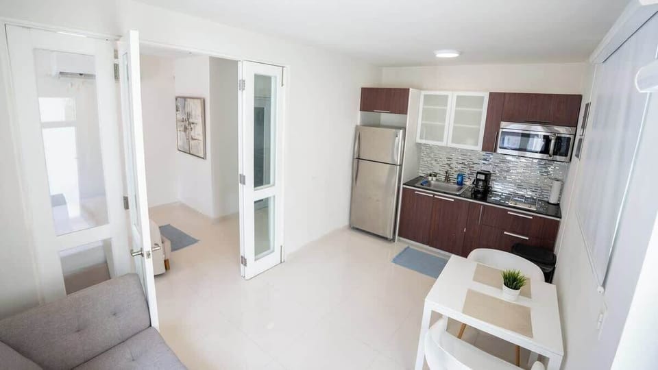 The kitchen sits just steps from the living area for added convenience.