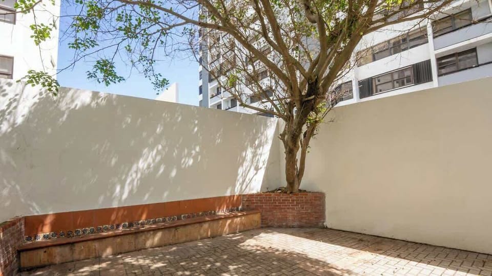 Enjoy a private outdoor space just minutes from the beach.