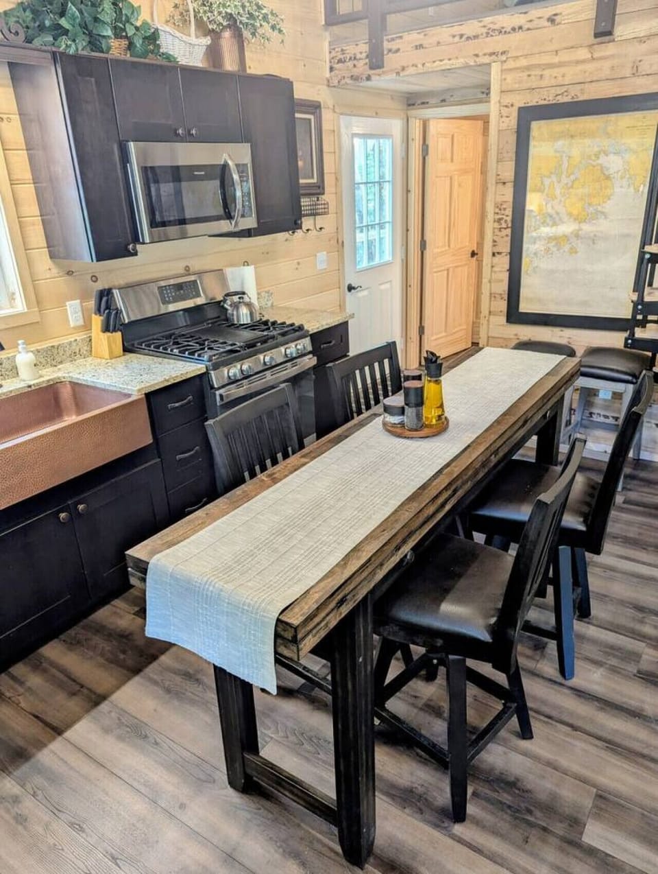 Compressed dining table. Kitchen with Gas stove
