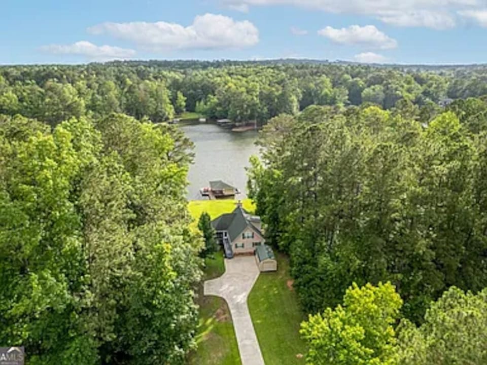 Serene lakehouse surrounded by peaceful nature