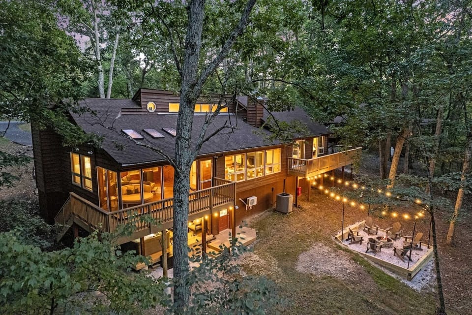 Imagine spending nights by the fire pit, soaking in the hot tub, or laughing in the screened in porch.