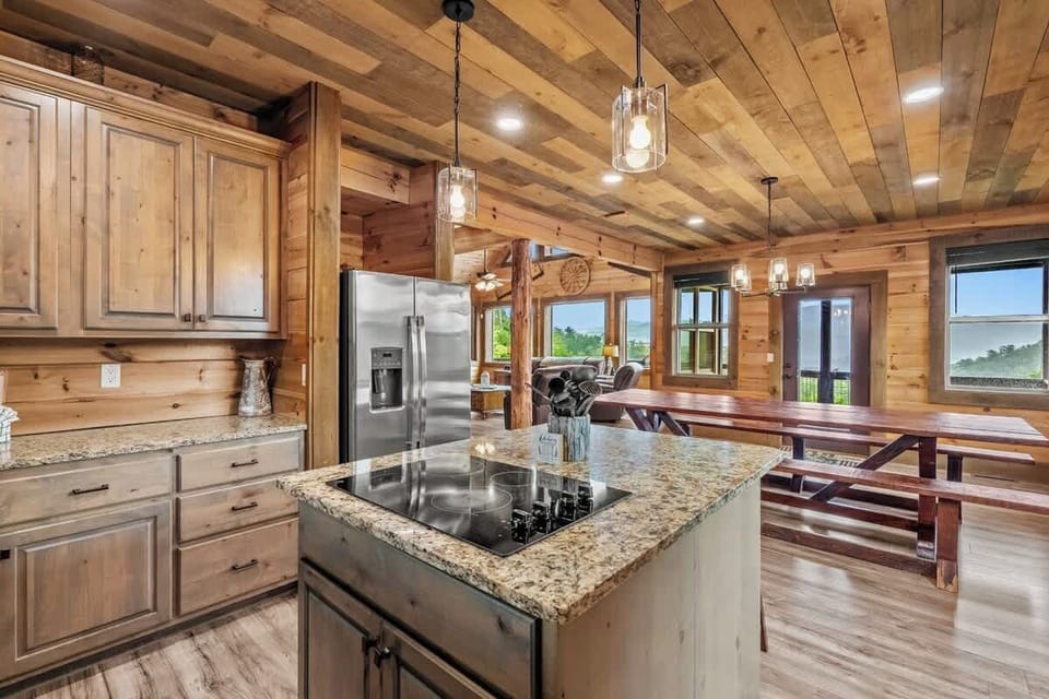 Kitchen & Dining: Rustic charm meets modern amenities with stunning views and inviting spaces!
