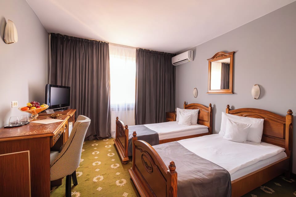 Basic Double or Twin Room | Desk, blackout drapes, iron/ironing board, free WiFi