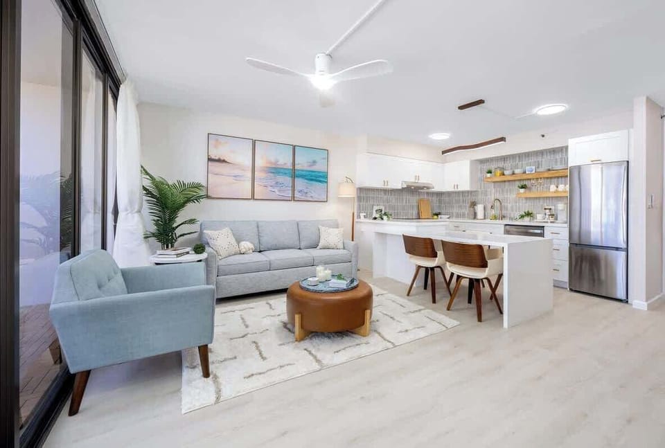 Settle into this bright, open-concept living area with a comfortable pull-out sleeper sofa, a well-appointed kitchen, and a dining space for 4.
