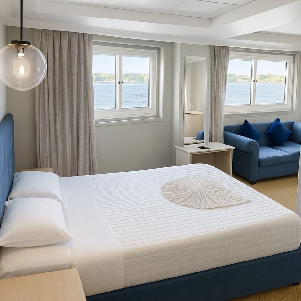 Deluxe Suite, River View | In-room safe, blackout drapes, soundproofing
