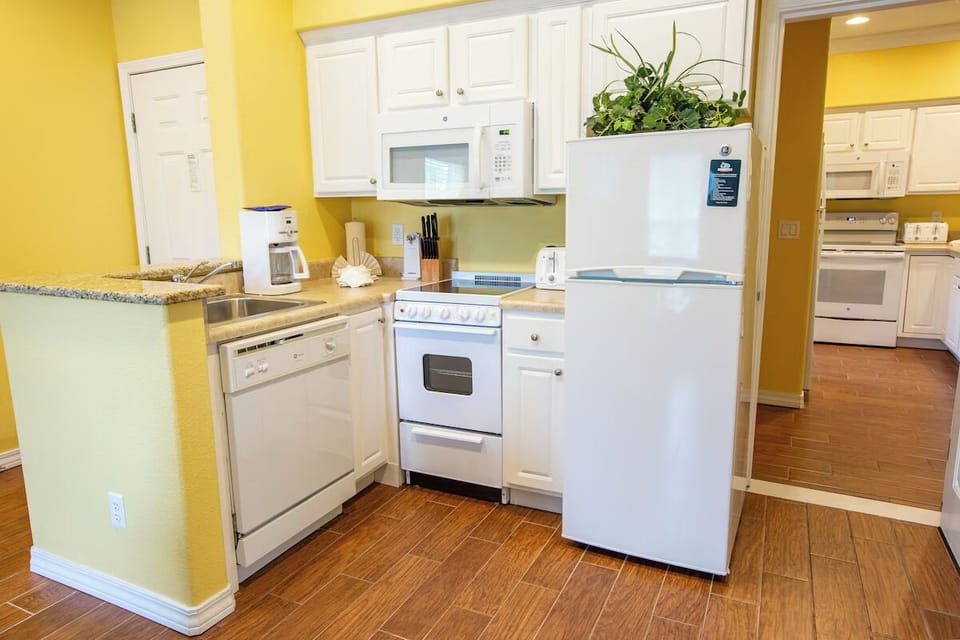Cook together in a bright kitchen with plenty of space.