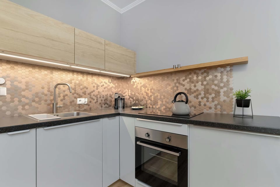 The fully equipped kitchenette includes everything you need for a home-cooked meal.