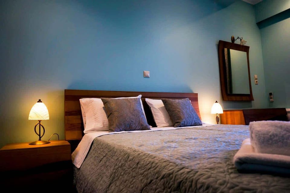 Elegant Bedroom with Plush Bedding – Featuring rich fabrics, ambient lighting, and a relaxing atmosphere.