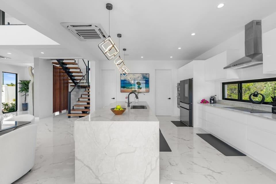 A wide view of the kitchen and living space.