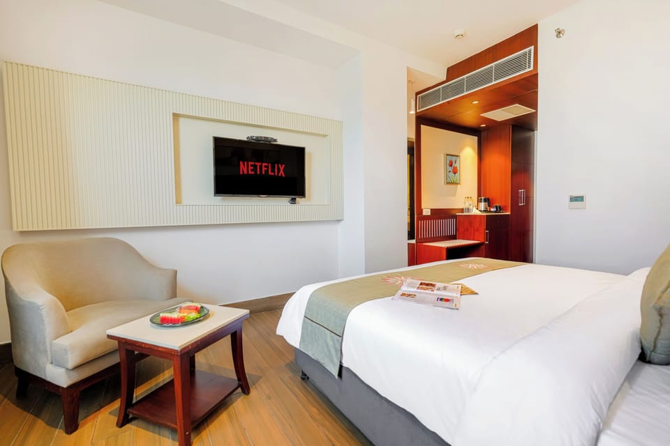 Deluxe Room, City View | Premium bedding, down comforters, desk, laptop workspace