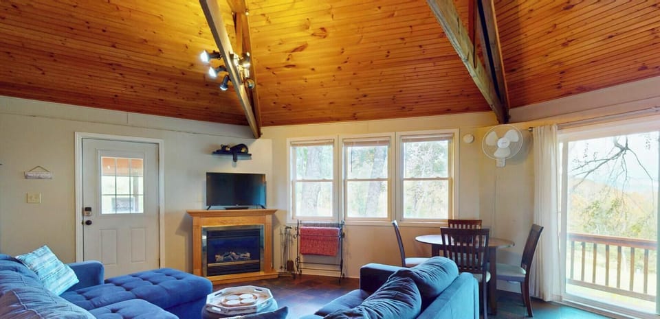 Cozy up after a day on the slopes in this bright mountain living space with ski-area views.