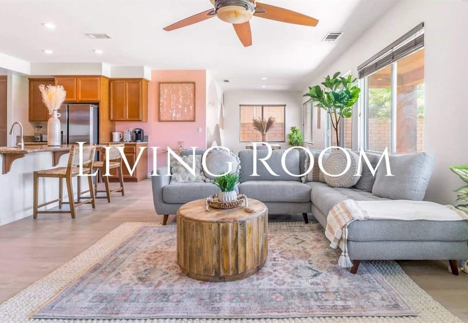 Settle into the living room where chic meets comfort, offering you a serene spot to lounge, chat, or catch up on your favorite shows