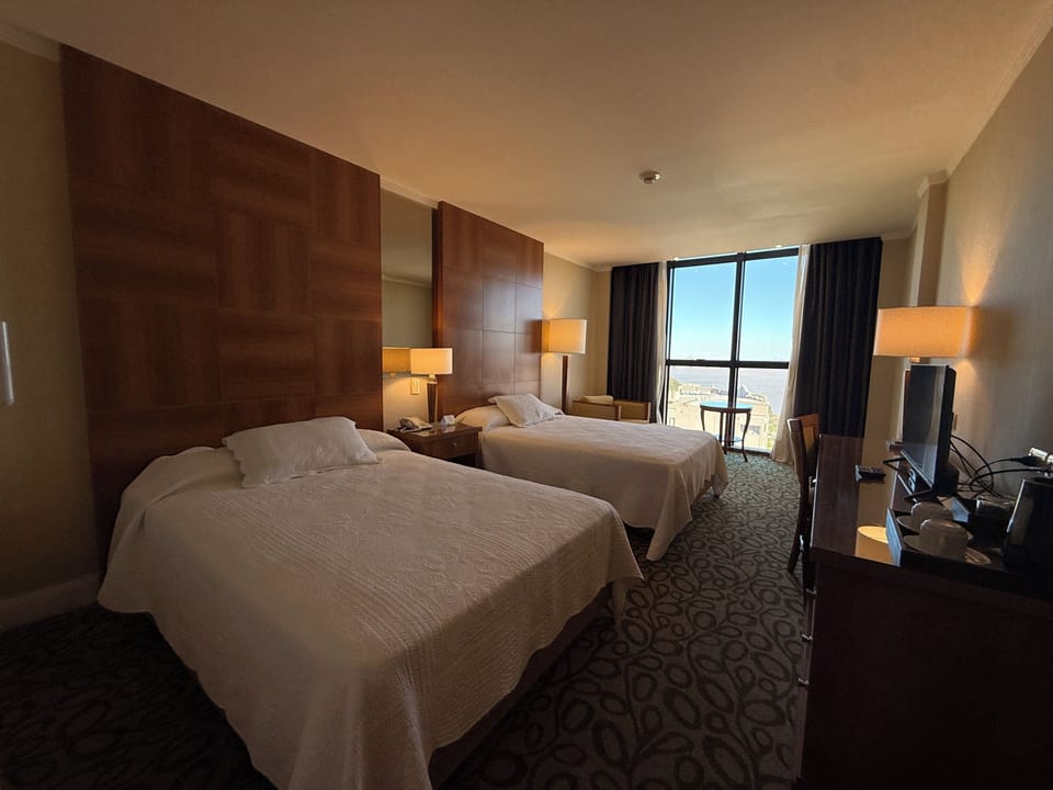 Superior Double Room, 2 Queen Beds, River View | Minibar, in-room safe, desk, laptop workspace