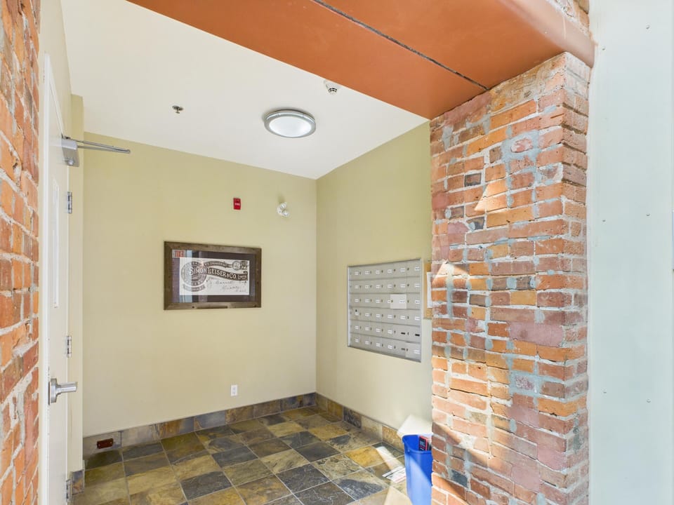 Secure interior building lobby with dedicated resident mailboxes.