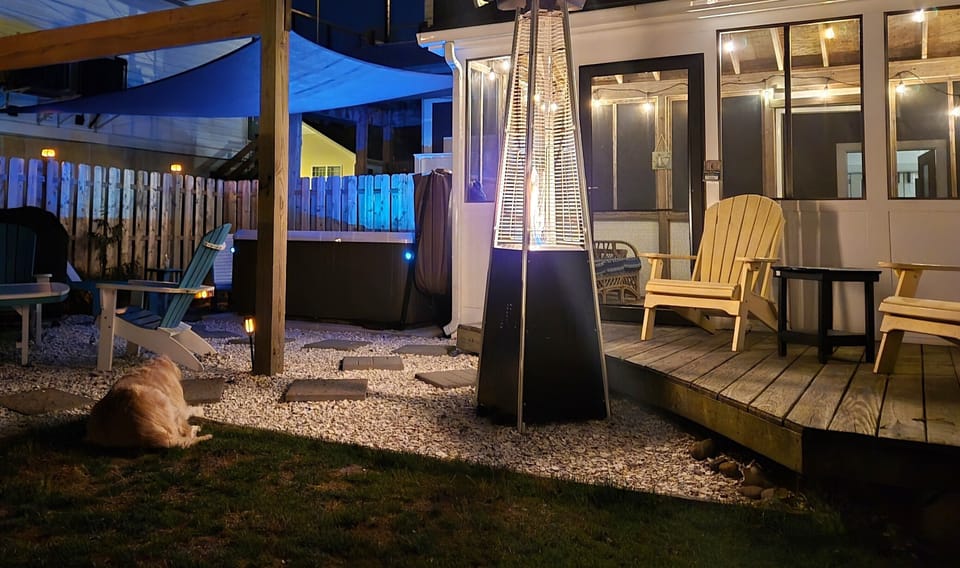 Enjoy an evening by the fire heater in our fully fenced, pet-friendly backyard oasis.