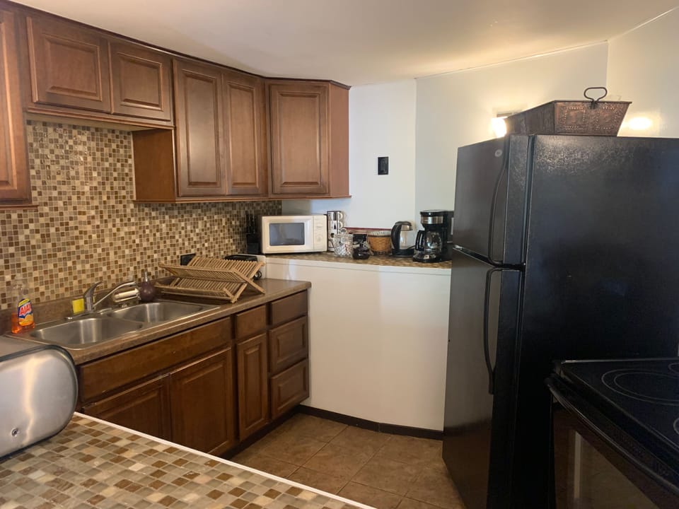 Full sized and fully stocked kitchen