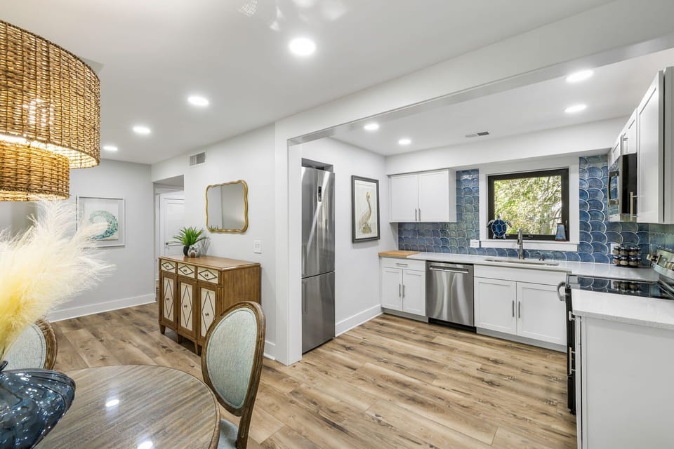With ample counter space and a convenient breakfast bar area, this kitchen makes vacation meal prep a breeze.
