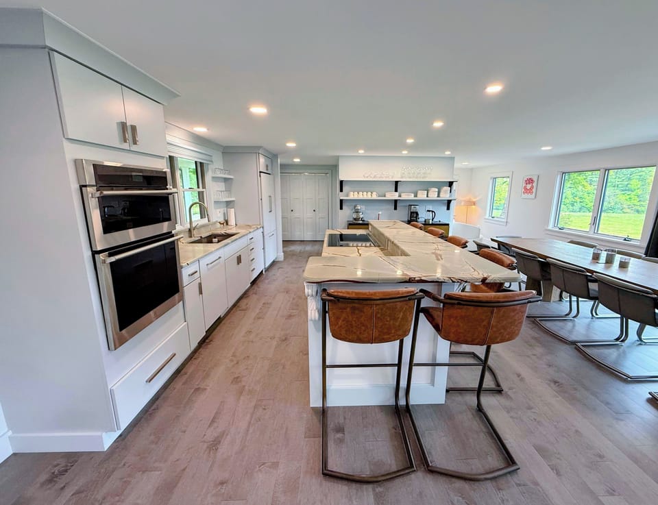 The luxury kitchen features an induction range, dual oven, and everything you need to prepare a gourmet meal.