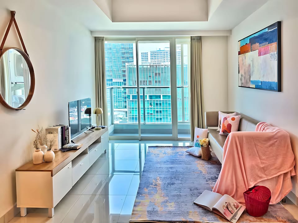Apartment, 1 Bedroom, City View | Living area | 43-inch Smart TV with cable channels