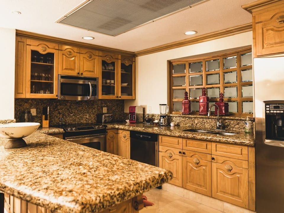 Updated kitchen with new granite and stainless appliances