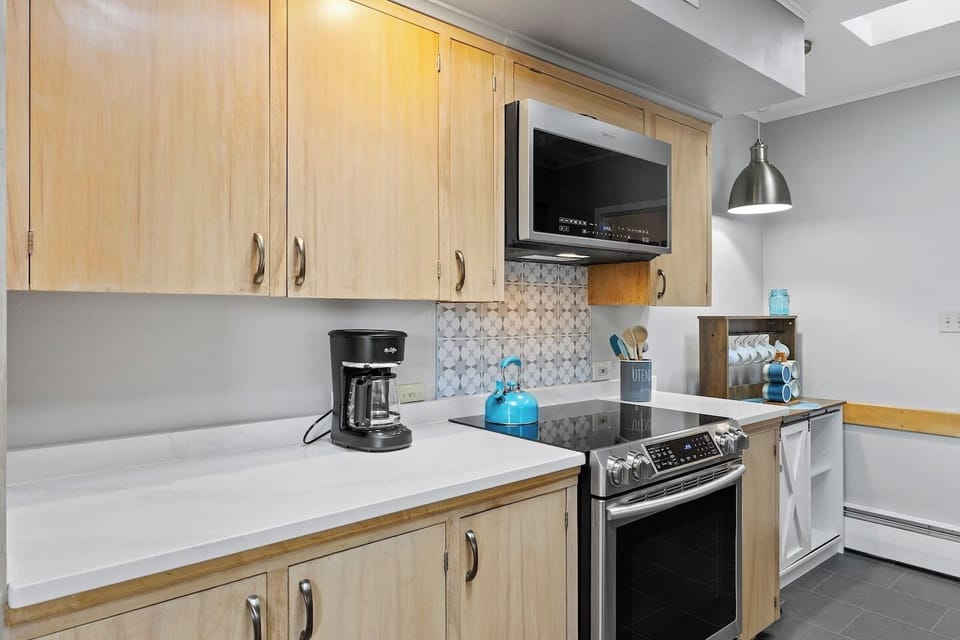 For your morning routine, a standard coffee maker is available, and we also provide fresh coffee beans so you can start your day with a rich, flavorful brew.