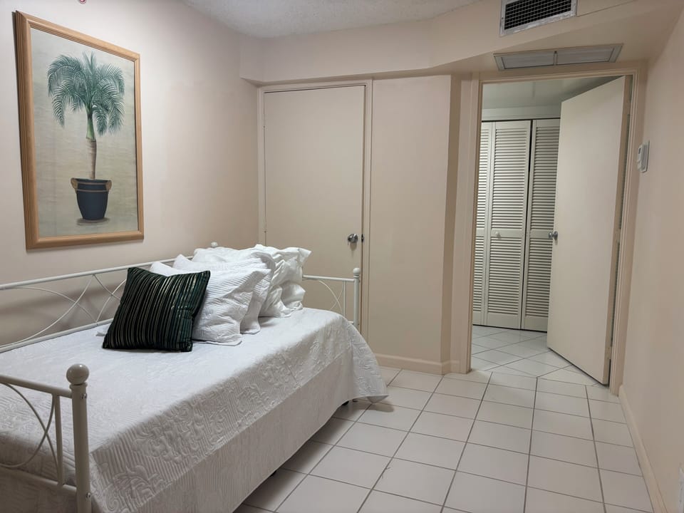 Den has a twin-size day bed with pull-out twin-size trundle.