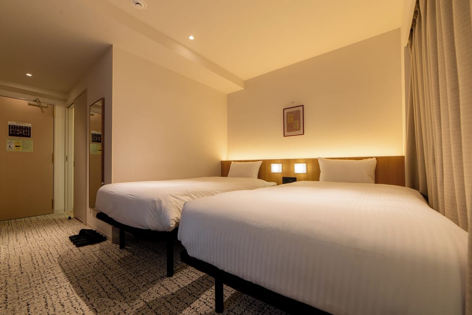 Twin Room, Non Smoking | Down comforters, in-room safe, desk, laptop workspace