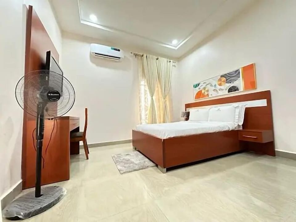 Economy Apartment, Balcony, City View | Desk, laptop workspace, blackout drapes, soundproofing