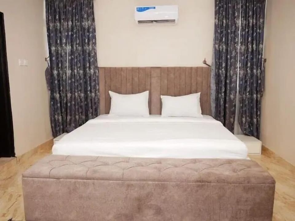 Family Apartment, Balcony, City View | Desk, laptop workspace, blackout drapes, soundproofing