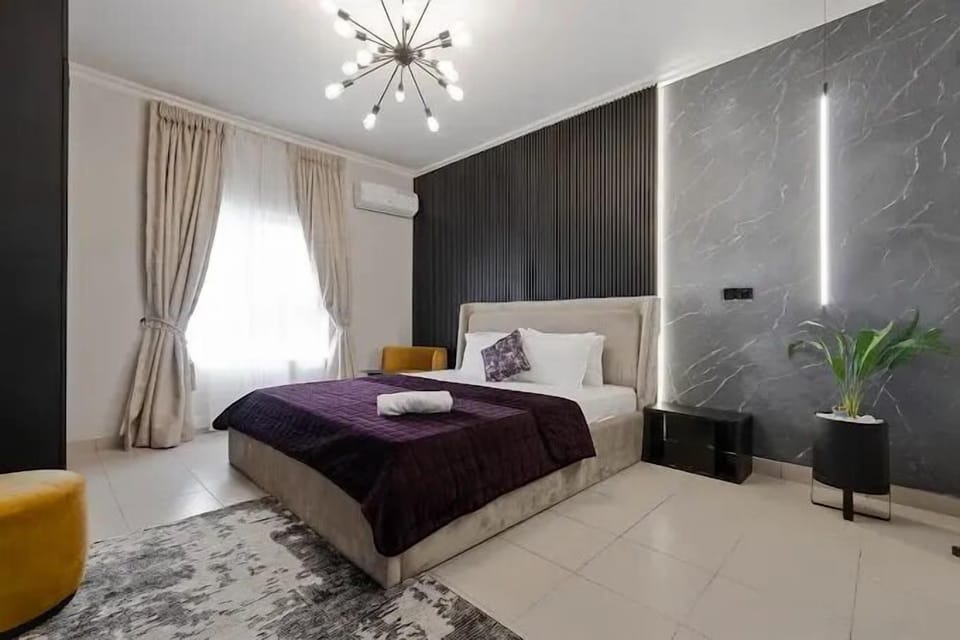 Family Apartment, Balcony, City View | Desk, laptop workspace, blackout drapes, soundproofing