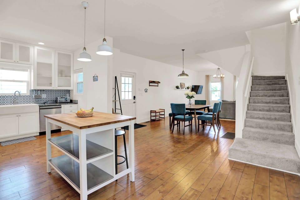 Open concept kitchen, dining, and living areas