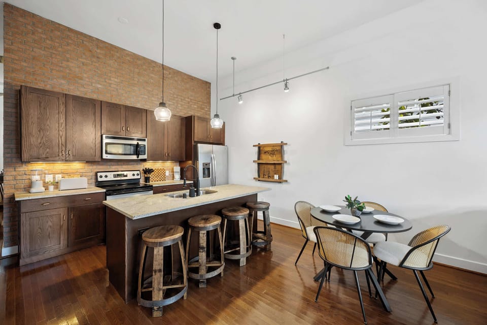 Kitchen: Discover the soul of our home in the heart of our kitchen. A sanctuary where culinary delights and laughter blend seamlessly, inviting you to linger longer, savor every aroma, and create unforgettable moments.