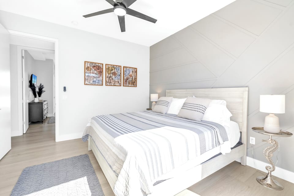 Bedroom bright and airy with sunshine.