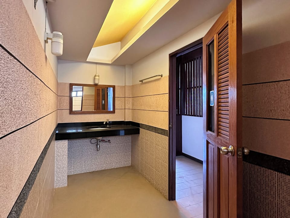 Private Room with Share Bathroom | Bathroom | Shower, free toiletries, hair dryer, towels