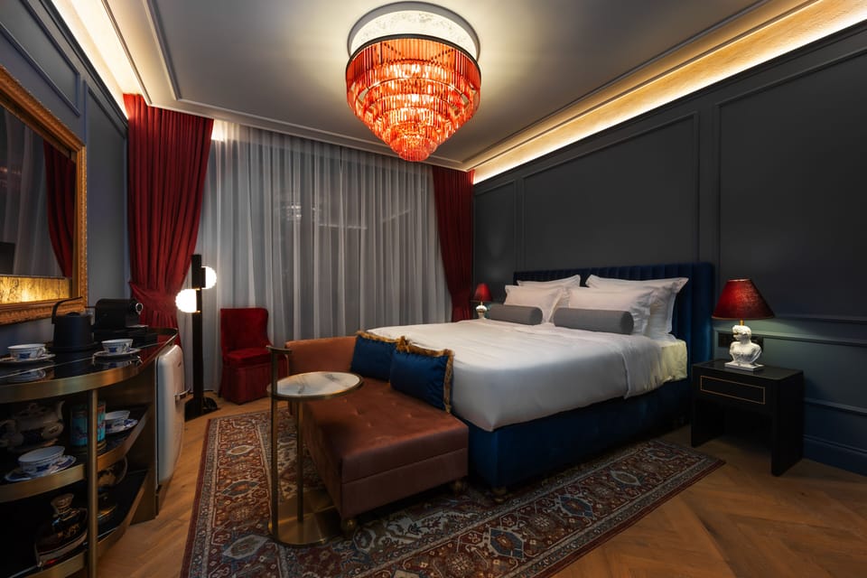 Premium bedding, down comforters, minibar, in-room safe