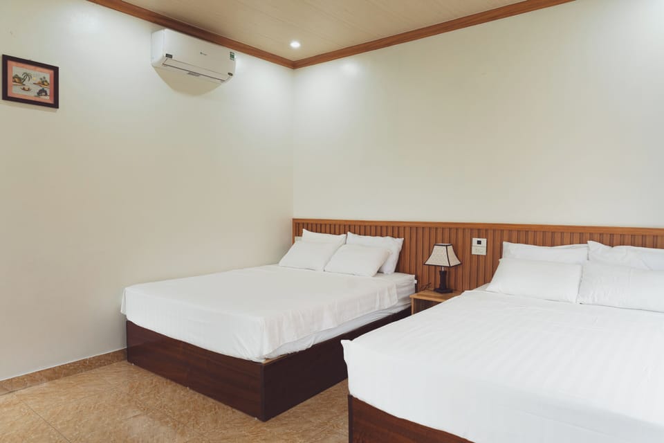 Family Quadruple Room, 2 Queen Beds, Non Smoking, Pool View | Premium bedding, down comforters, memory foam beds, minibar