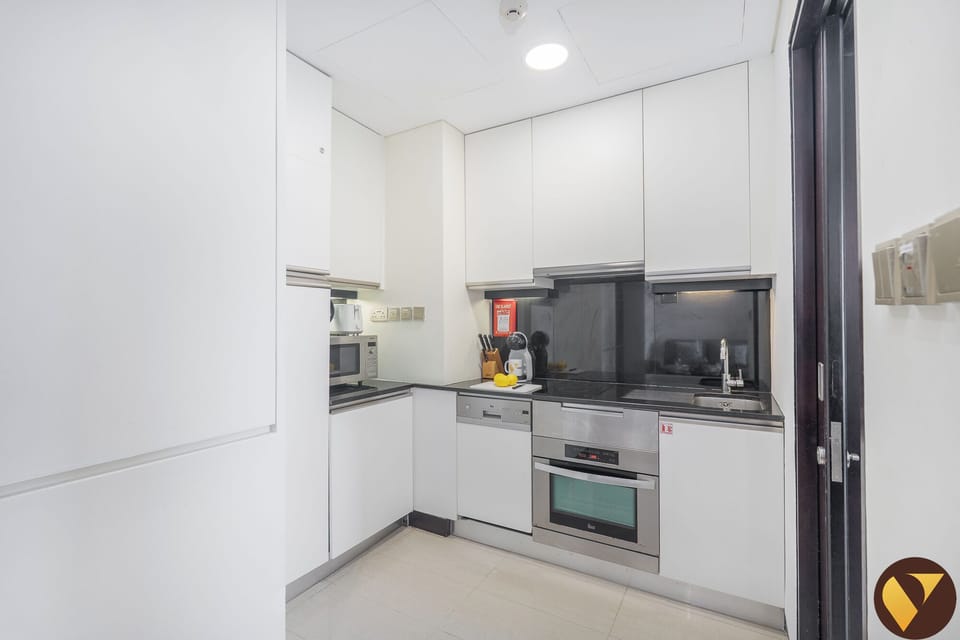 Luxury Studio, Balcony | Private kitchen | Full-size fridge, microwave, oven, stovetop