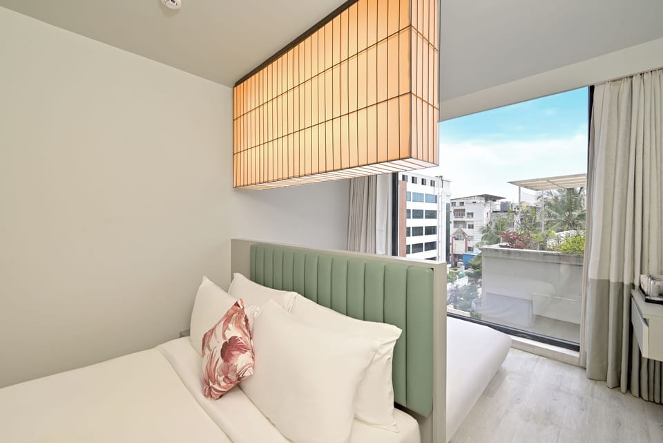 Premium Vibe | Premium bedding, in-room safe, blackout drapes, iron/ironing board