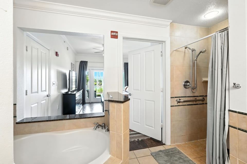 A bright and modern full bathroom offering comfort, convenience, and a refreshing spa-like feel.