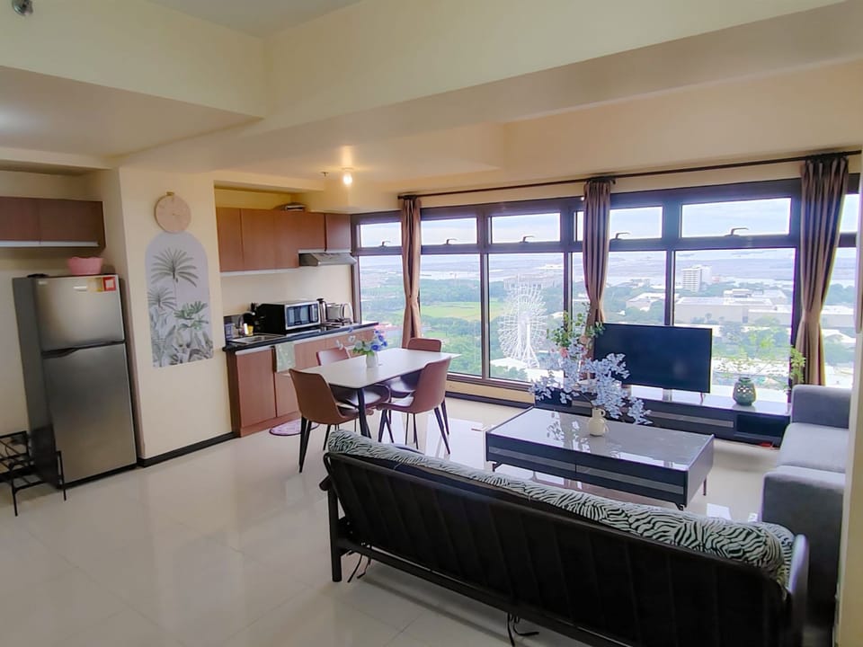 Signature Condo, 1 Bedroom, Non Smoking, Kitchen | Living room | 30-inch flat-screen TV with digital channels