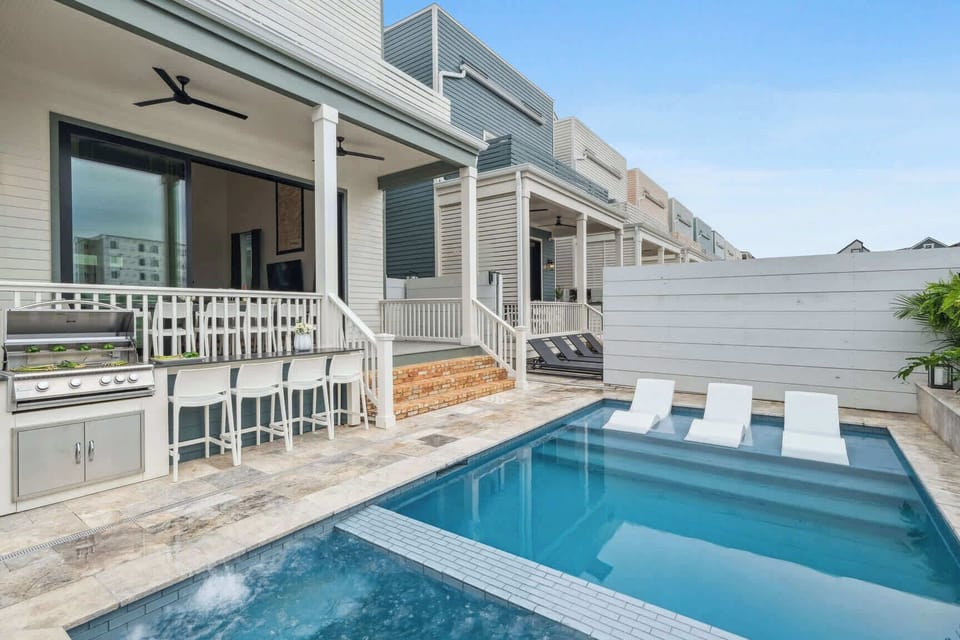 Minor differences in pool design and grill location among the eight homes.
