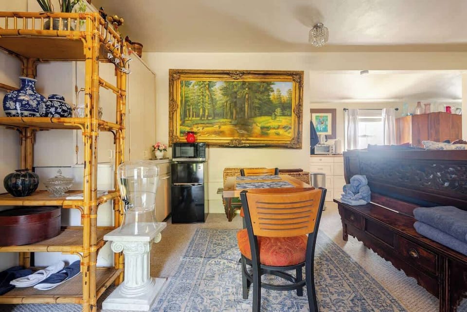 Charming dining nook with stylish accents and a welcoming atmosphere for meals or coffee.