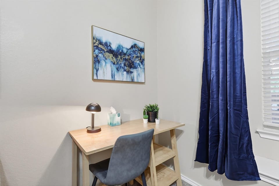 Looking for a quiet space to wrap up some work or get caught up on some studying? This dedicated work station includes a desk, lamp, chair, and even some storage!