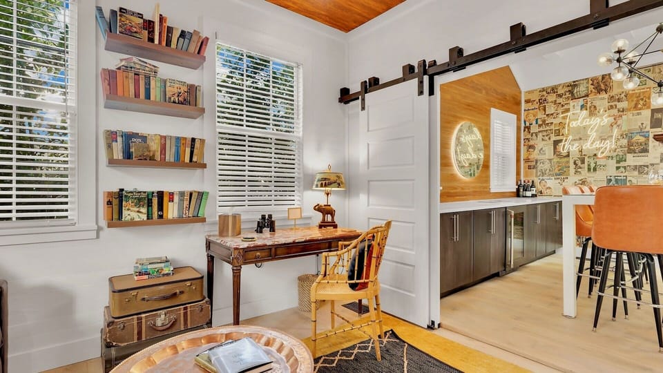 Escape to the cozy den, complete with vintage charm and curated books...