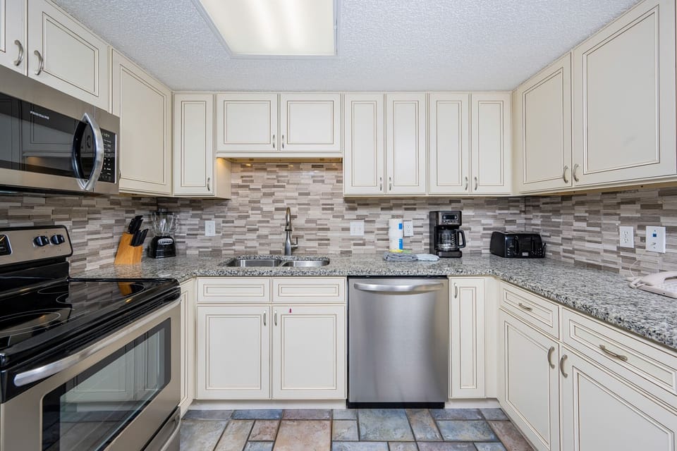 Condo, 2 Bedrooms | Private kitchen | Coffee/tea maker, fridge, oven