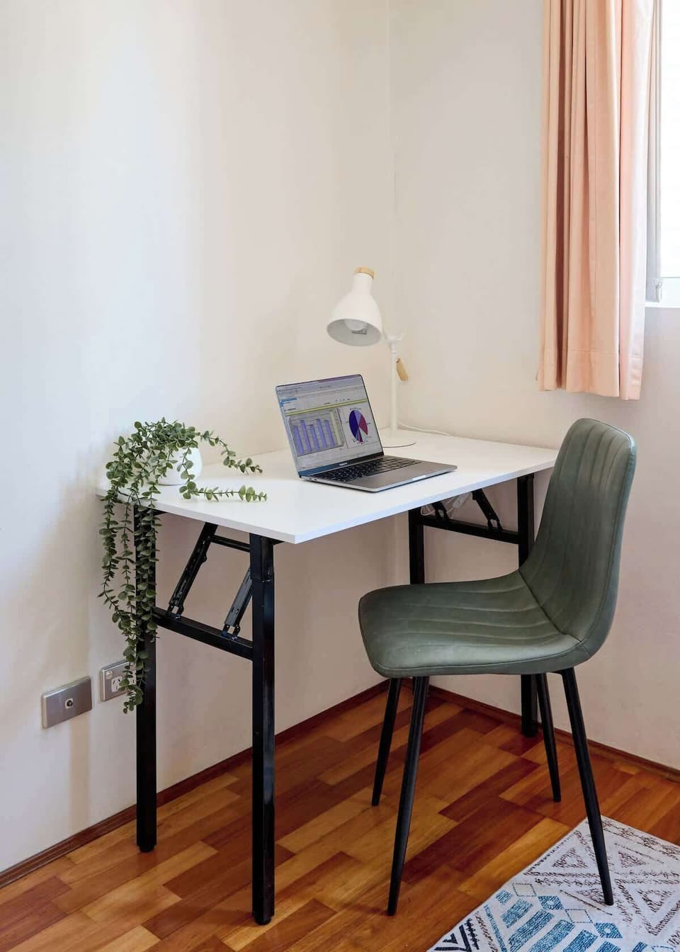 Dedicated workspace with task lighting, and comfortable chair. Perfect setup for business travelers or remote work with city views providing inspiring backdrop for productive sessions.