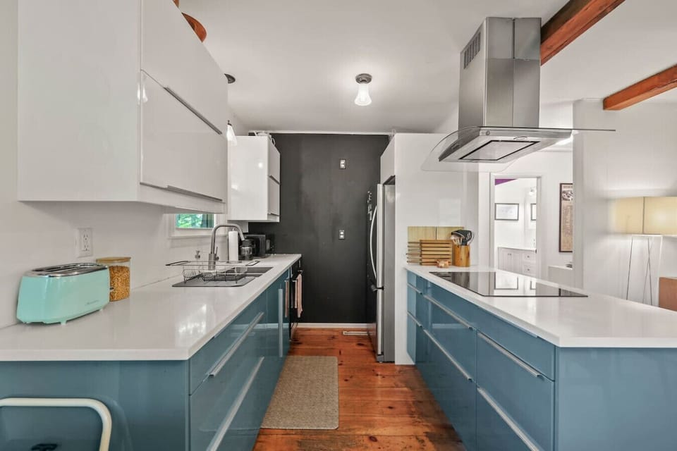 Bright kitchen with ample counter space and storage.